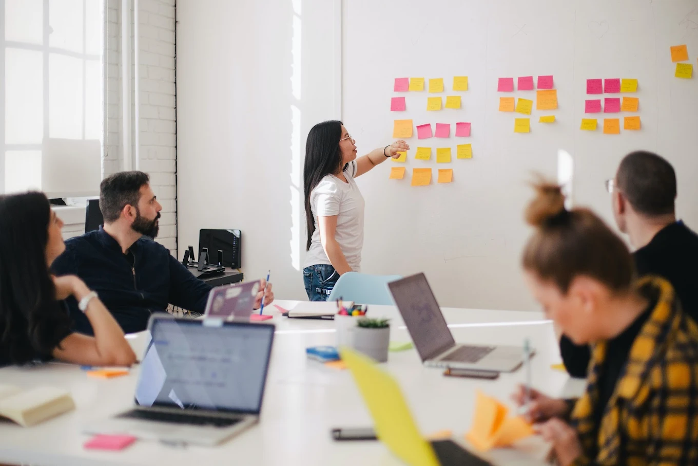 Professional marketing team collaborating in modern office